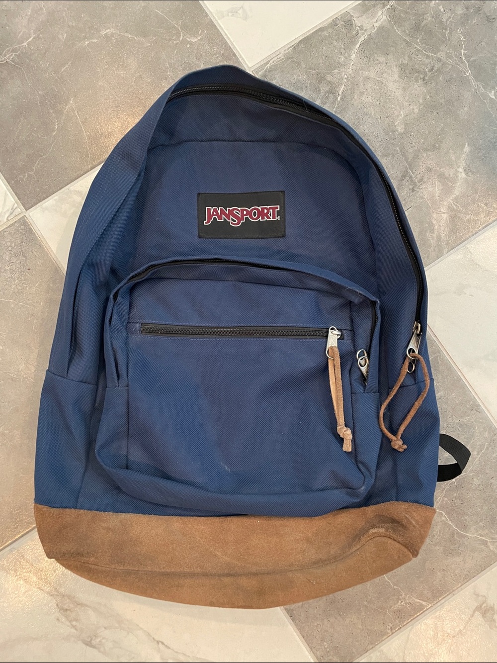 Jansport Navy Backpack with Brown Suede Base